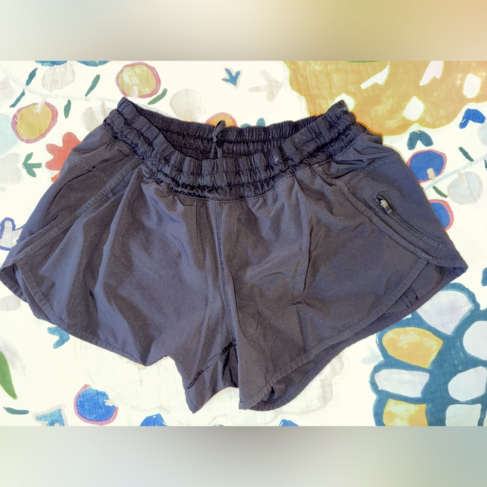 Lululemon tracker exercise/running short in black size 12